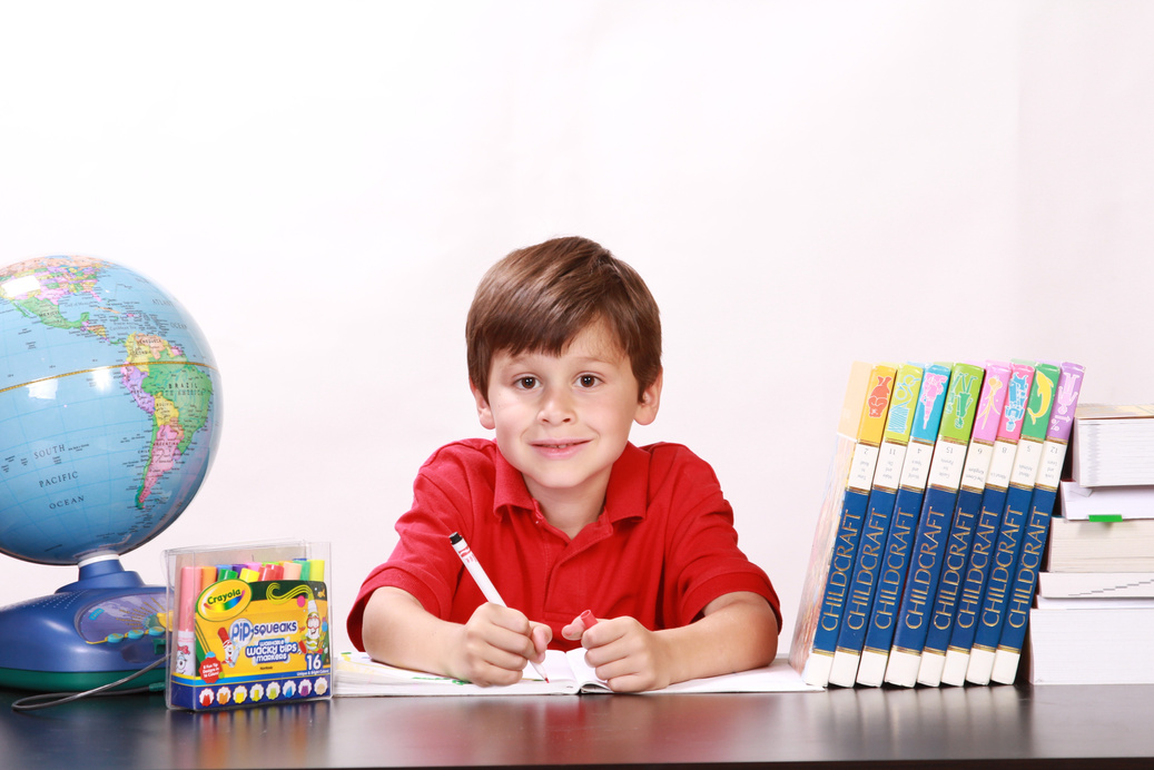 Little Boy Coloring His Book